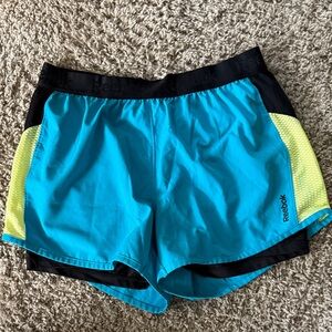 Women’s Reebok Turquoise and Neon Yellow Running Shorts Mesh Biker Sz Medium